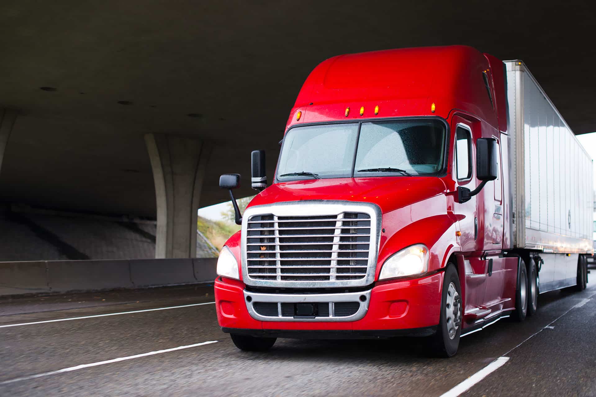 Truck Driving Under Bridge