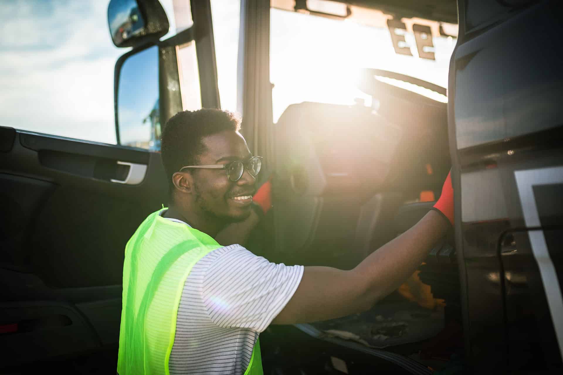 Truck Driver Getting in Truck